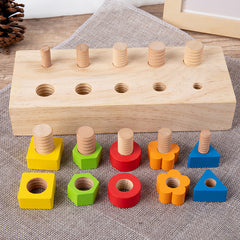 Close-up of building blocks on Children's screw tightening tool table