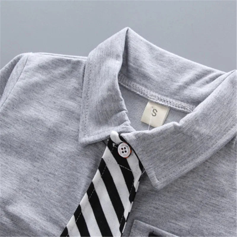 → Alt: Child playing while wearing Boys Spring Clothing Set for casual spring activities