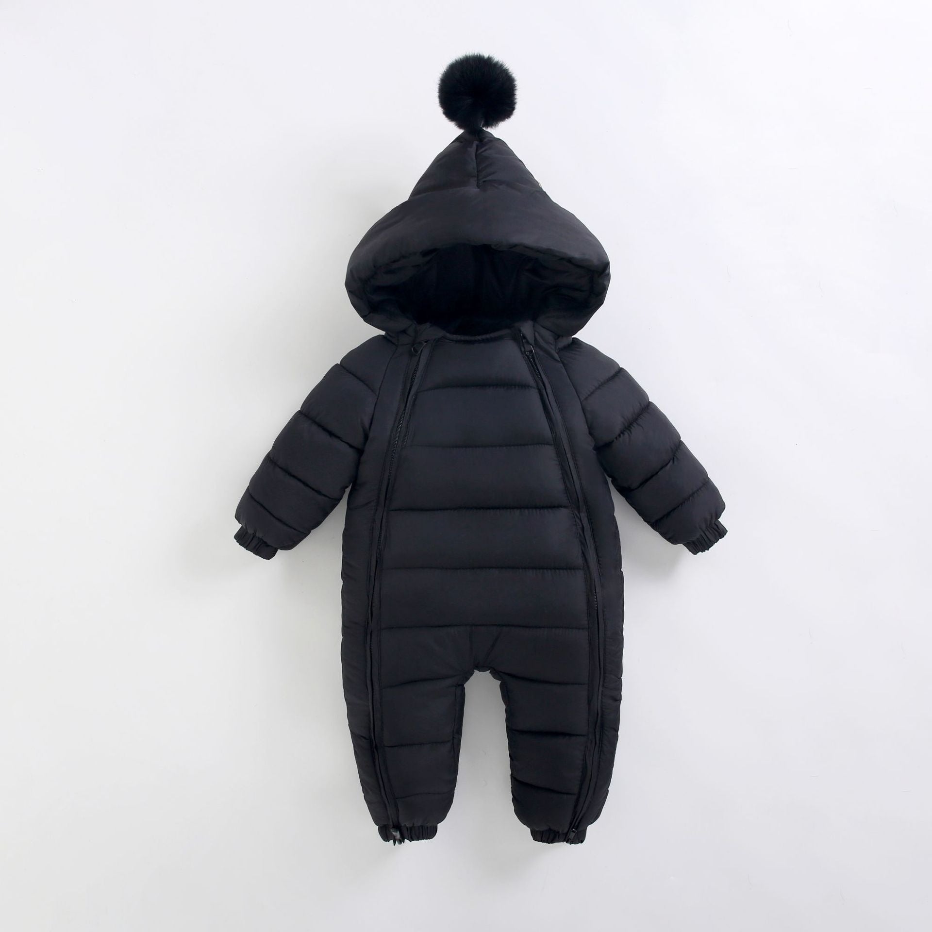 alt="Toddler playing in Baby Winter Jumpsuit with cozy hood"