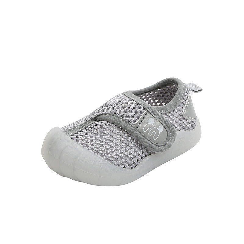 → Alt: Infant wearing Children’s Sports Shoes for safe walking and play