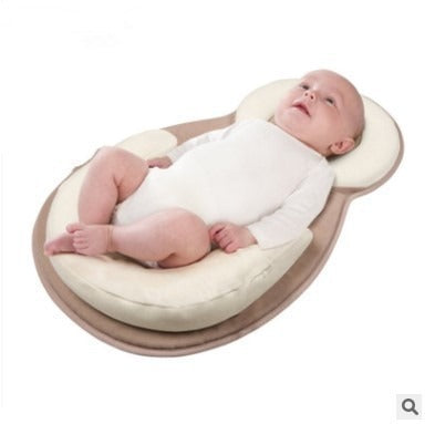 Baby Snuggle Nest Sleeper with soft and breathable head support pillow