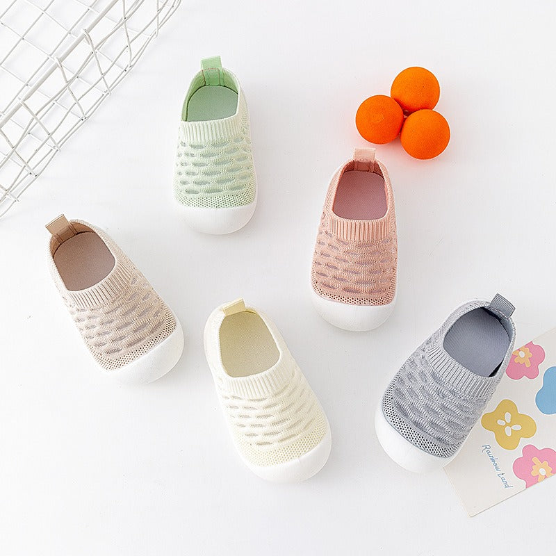 → Alt: Close-up of soft soles on Baby Walking Shoes for delicate feet