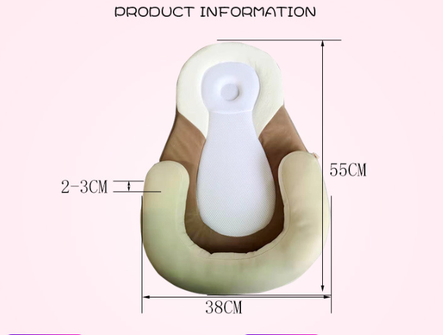 Flat lay of Baby Snuggle Nest Sleeper with head support pillow