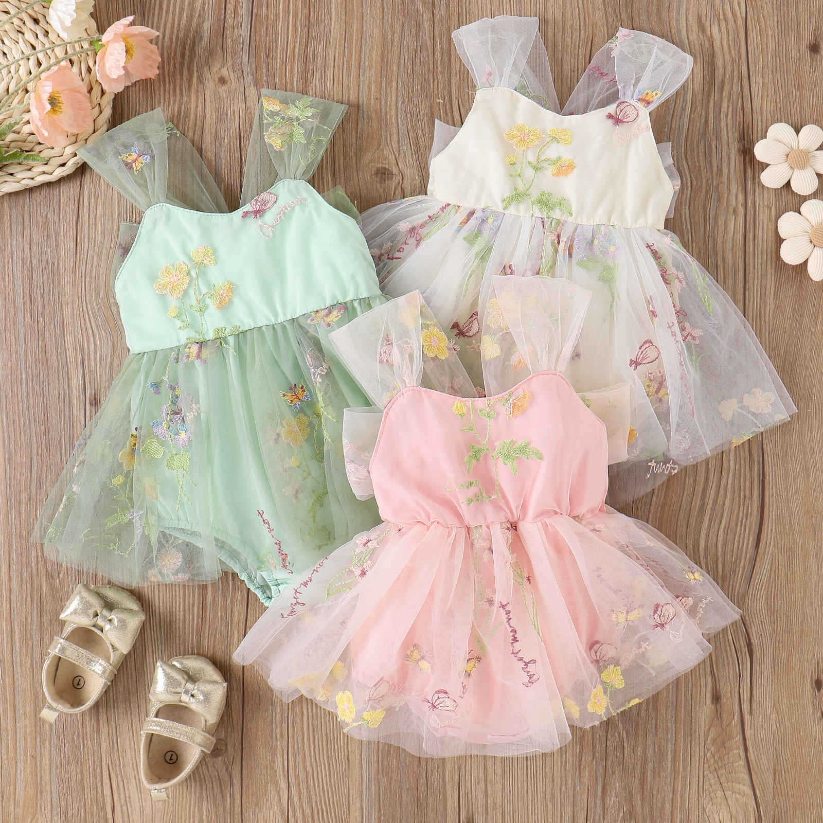 Girls' baby suspenders with embroidered flowers front view