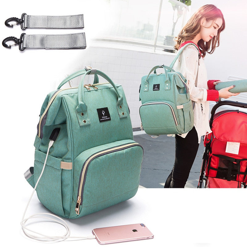 <img src="waterproof-usb-maternity-backpack-travel.jpg" alt="Waterproof USB Maternity Backpack for travel and baby care">