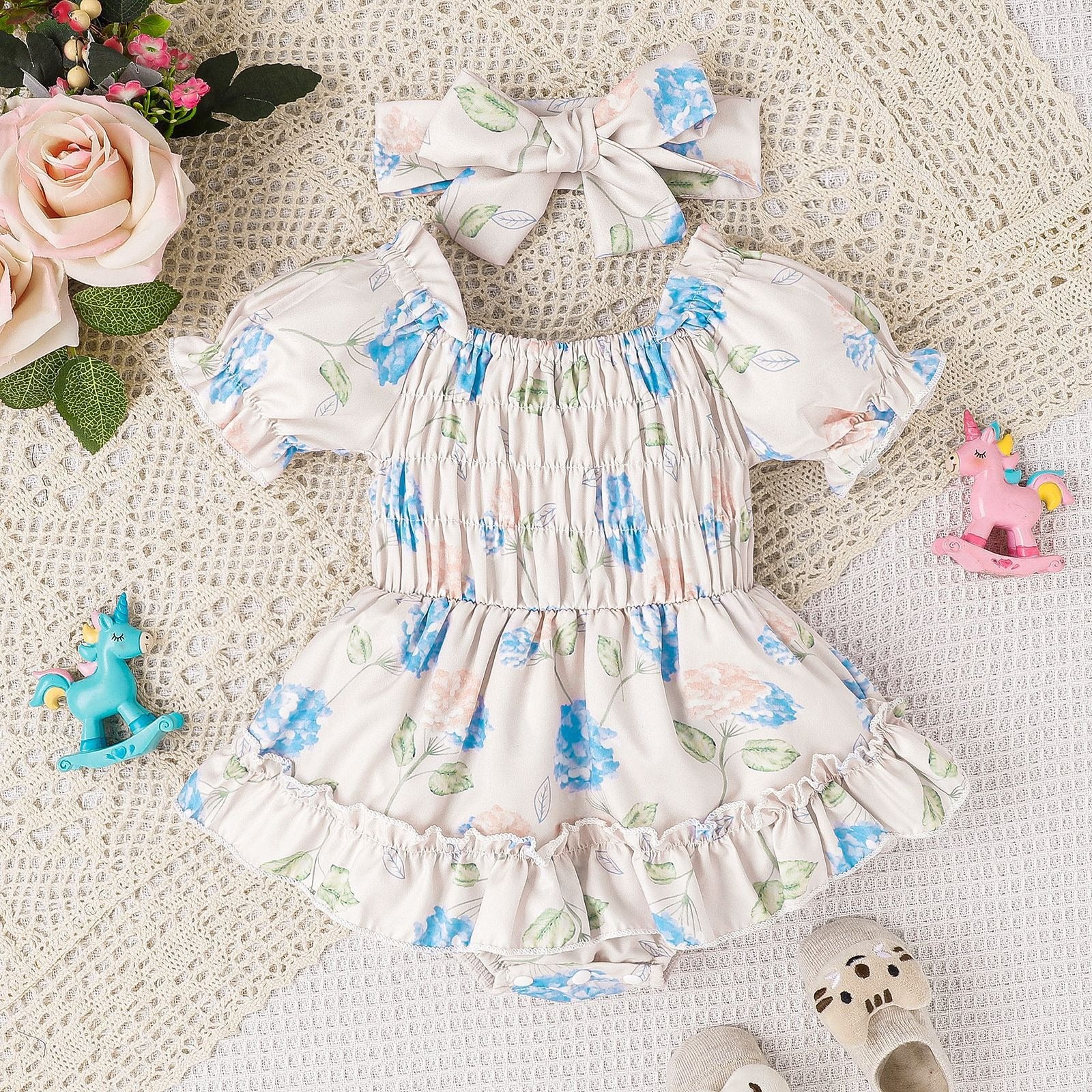"Baby wearing Baby and Toddler Two Color Floral Skirt Hem Jumpsuit standing"