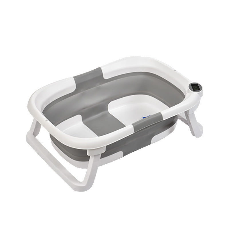 Parent bathing baby in Newborn Baby Bath Tub with Temperature Display