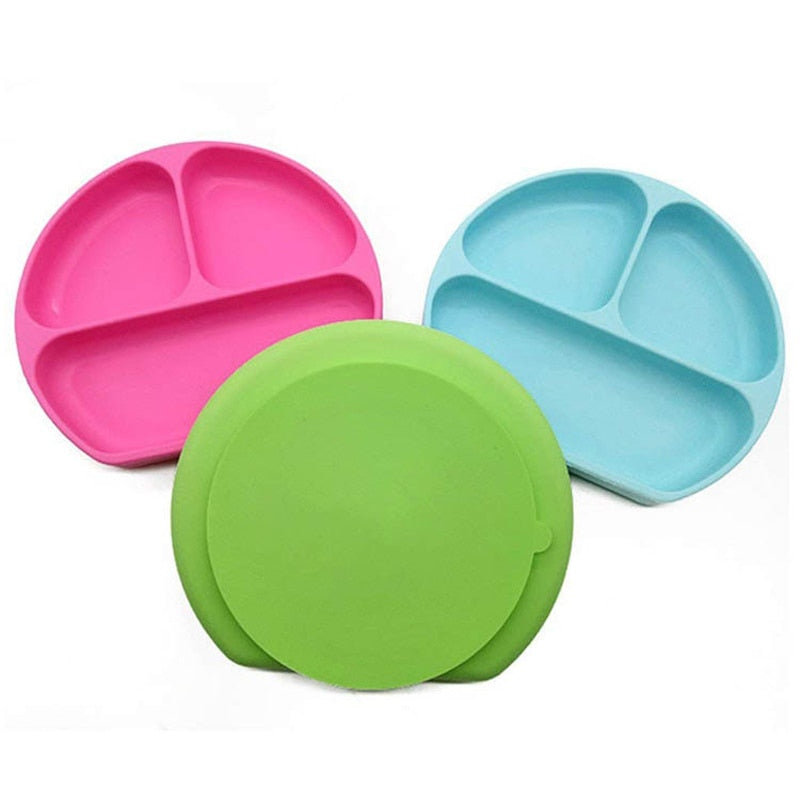 baby eating from non-spill baby feeding bowl