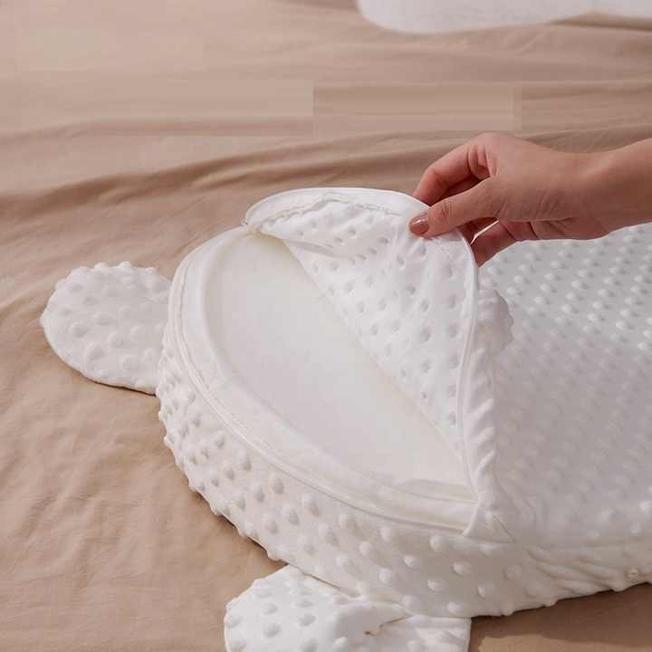 "Parent holding Four Season Anti Milk Overflow and Choking Pillow Baby Feeding Tool Baby Anti Spitting Slope Pad"