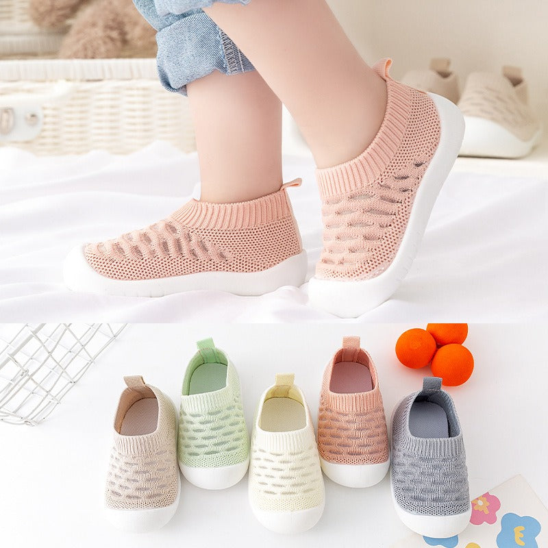 → Alt: Baby Walking Shoes worn during playtime for safety and comfort