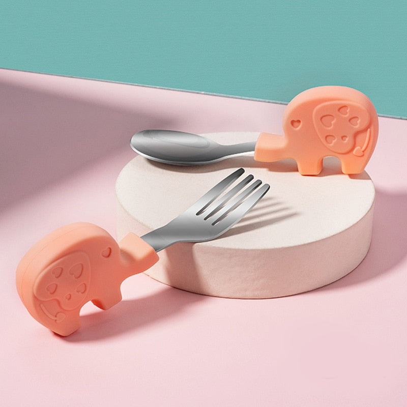 Silicone Non-Spill Baby Feeding Bowl and Spoon Set showing sturdy suction design