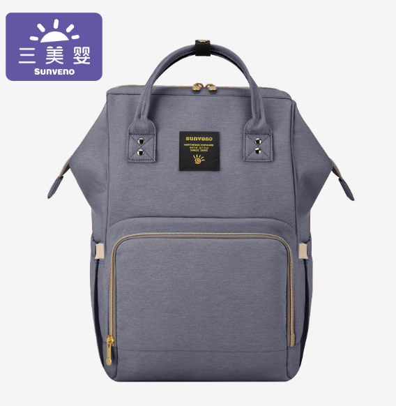 → Alt: Maternity Diaper Bag attached to stroller for hands-free convenience