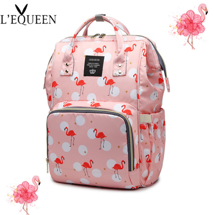 → Alt: Open view of Maternity Backpack showing organized compartments for diapers and bottles