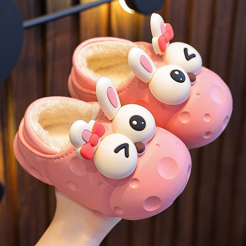 Flat lay of Baby Cotton Slippers in colorful autumn and winter designs