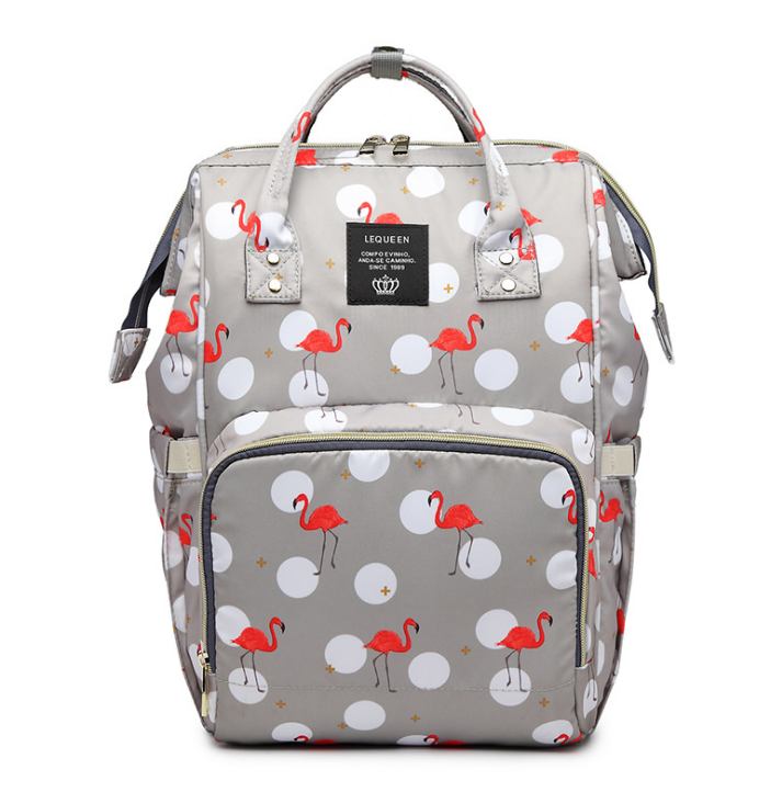 → Alt: Multiple pockets and compartments inside Maternity Backpack for easy organization