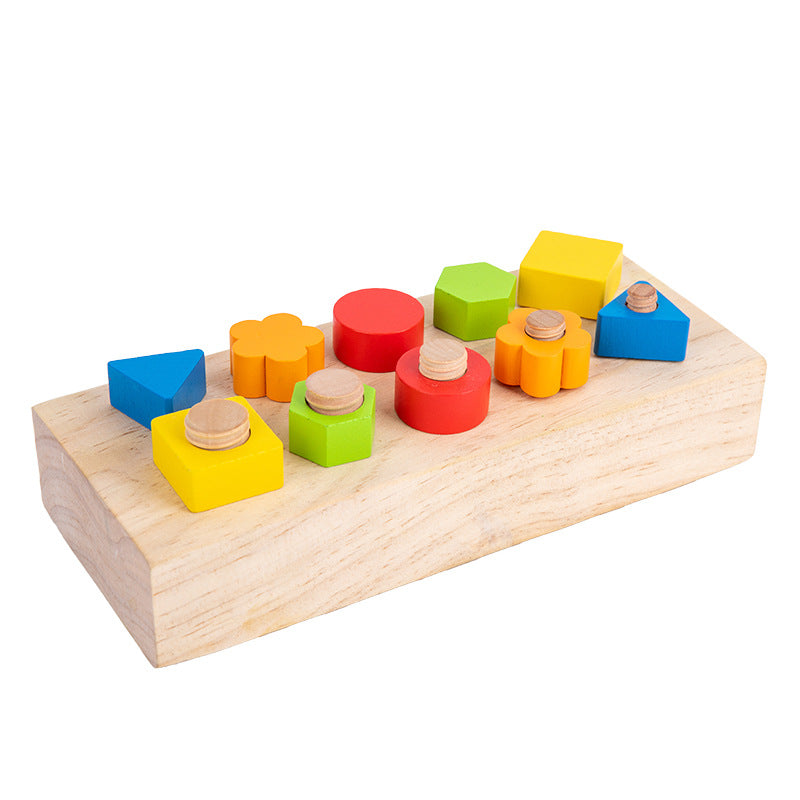 Color matching puzzle activity on Children's screw tightening tool table
