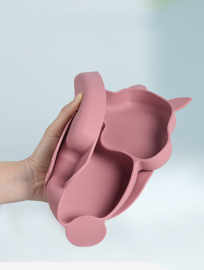 Baby using Children’s Silicone Dinner Plate for self-feeding