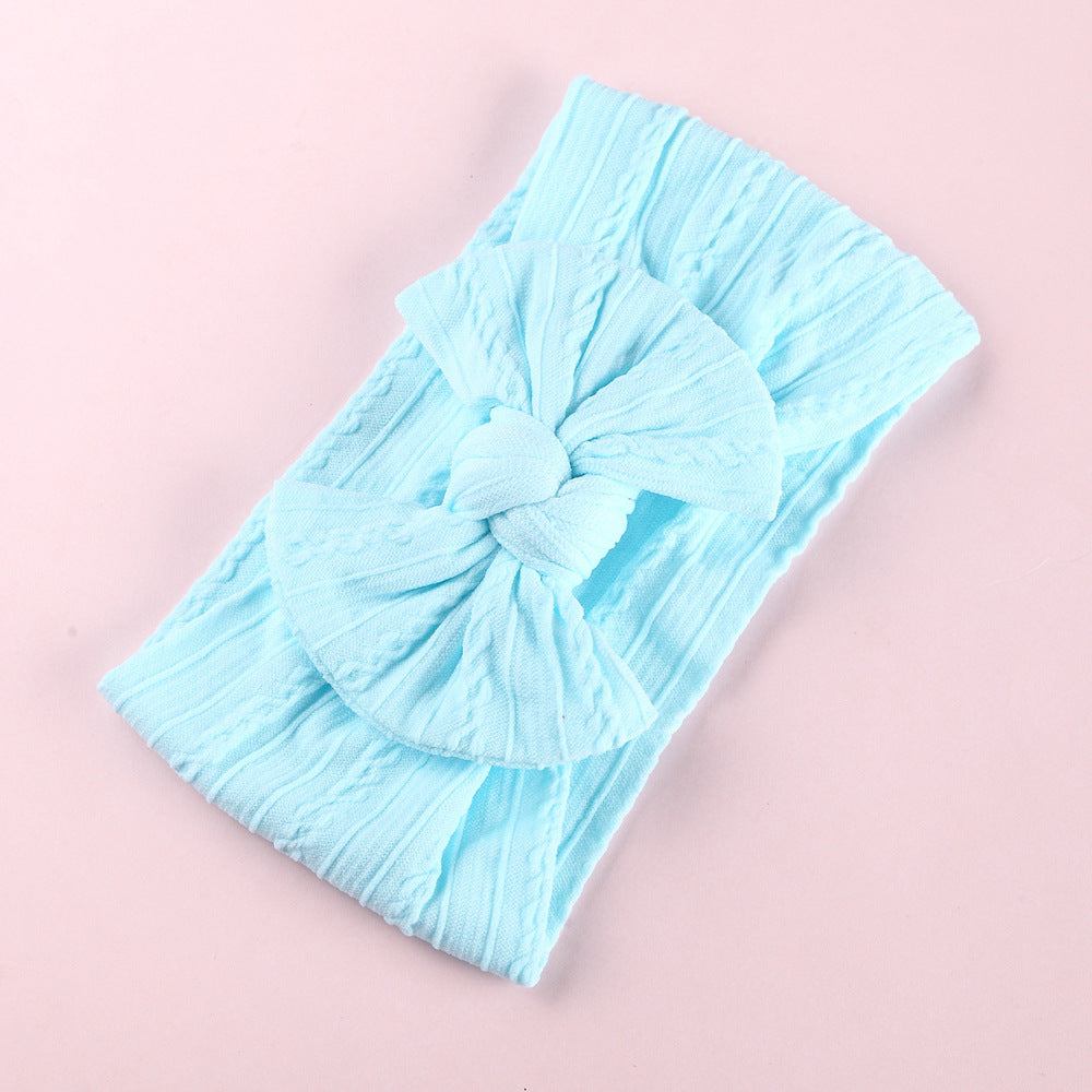 Toddler wearing Elastic Nylon Baby Headband for everyday style