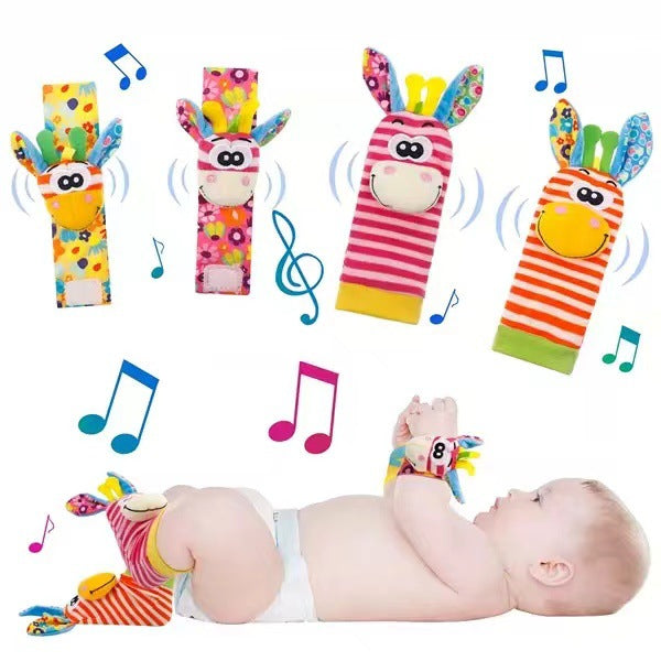 Newborn wearing Baby Wrist Bell Socks during playtime