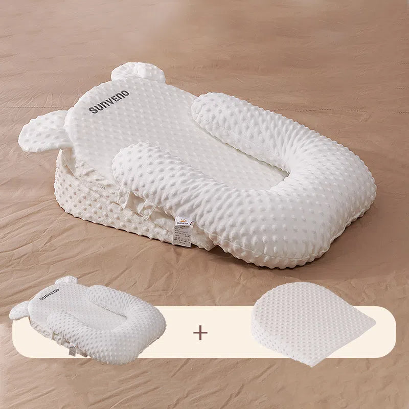 "Side view of Four Season Anti Milk Overflow and Choking Pillow Baby Feeding Tool Baby Anti Spitting Slope Pad"