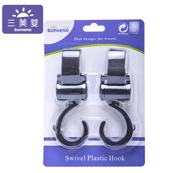 → Alt: Maternity Diaper Bag hanging on stroller hooks for easy access