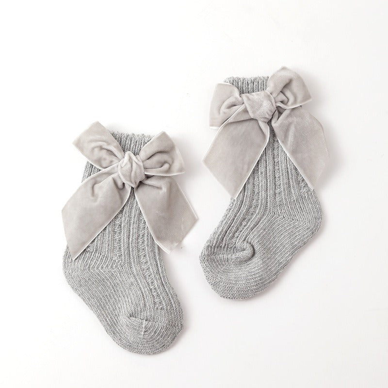 Toddler wearing Baby Thick Needle Socks indoors
