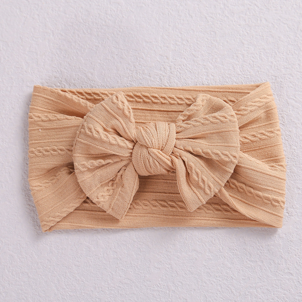 Toddler wearing Elastic Nylon Baby Headband for everyday style