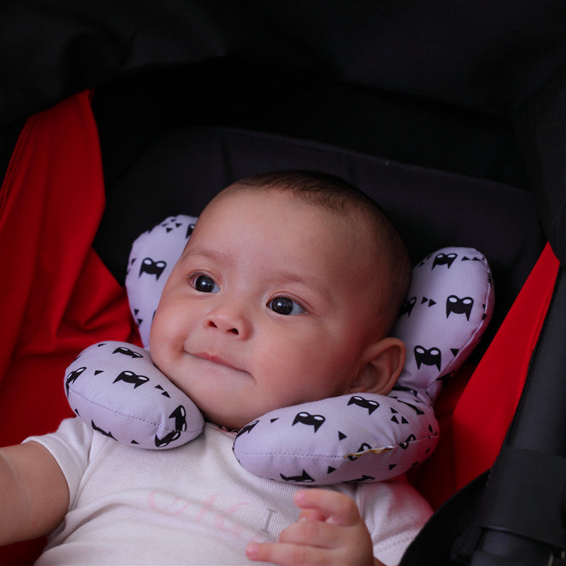 alt="Baby using U-Shaped Pillow Head Protection in stroller