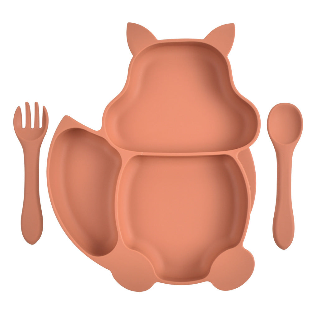 Toddler enjoying meal with Children’s Silicone Dinner Plate