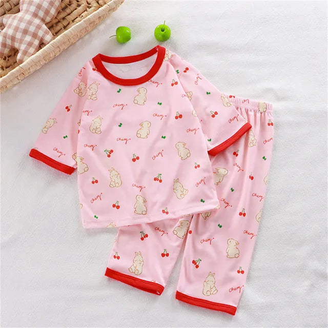 → Alt: Child playing while wearing comfortable Children Summer Pajamas