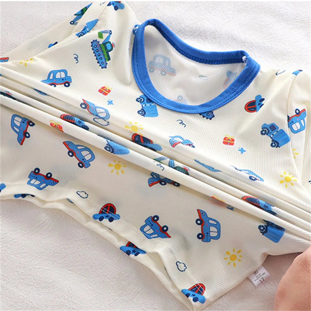 → Alt: Child wearing Children Summer Pajamas for comfortable home lounging