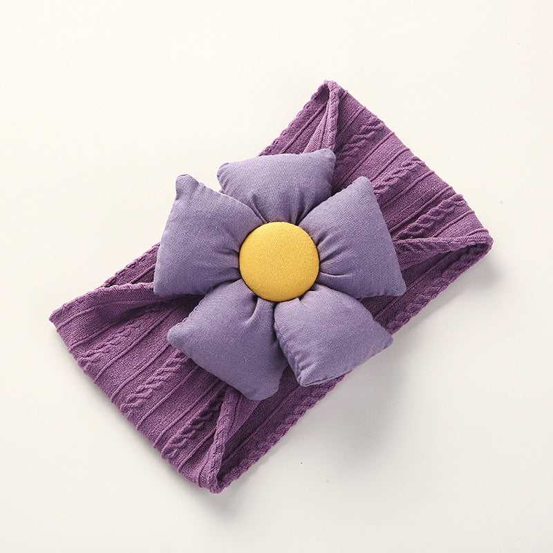 Soft Jacquard Nylon Baby Headband worn by smiling baby during playtime