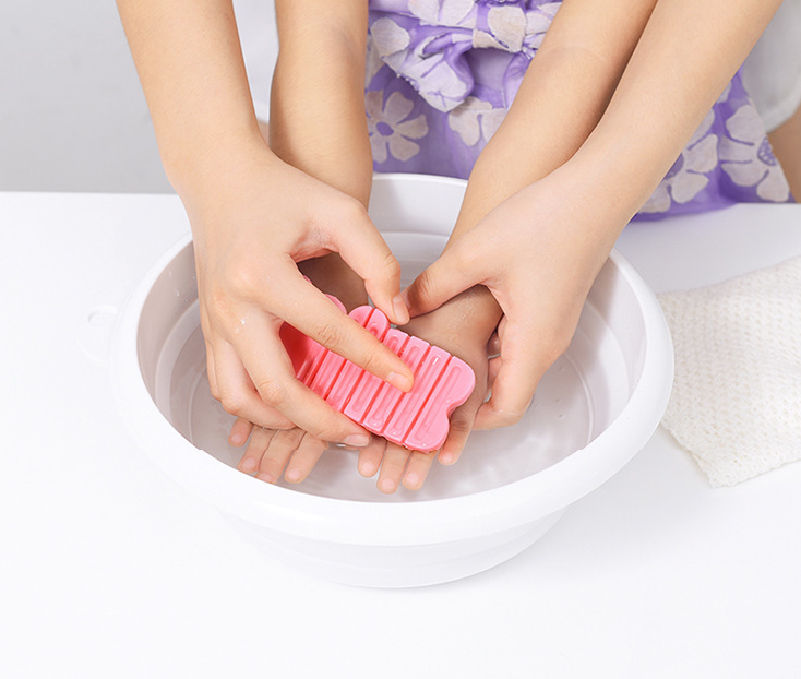 alt="Close-up of Cartoon hand washing brush baby and children's hand washing tool"