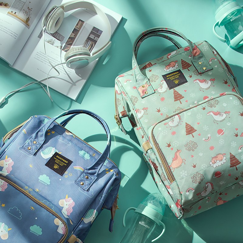 → Alt: Maternity Diaper Bag used as a stylish handbag for mothers on the go