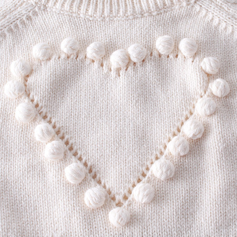 Baby wearing Baby handmade knitted sweater while crawling
