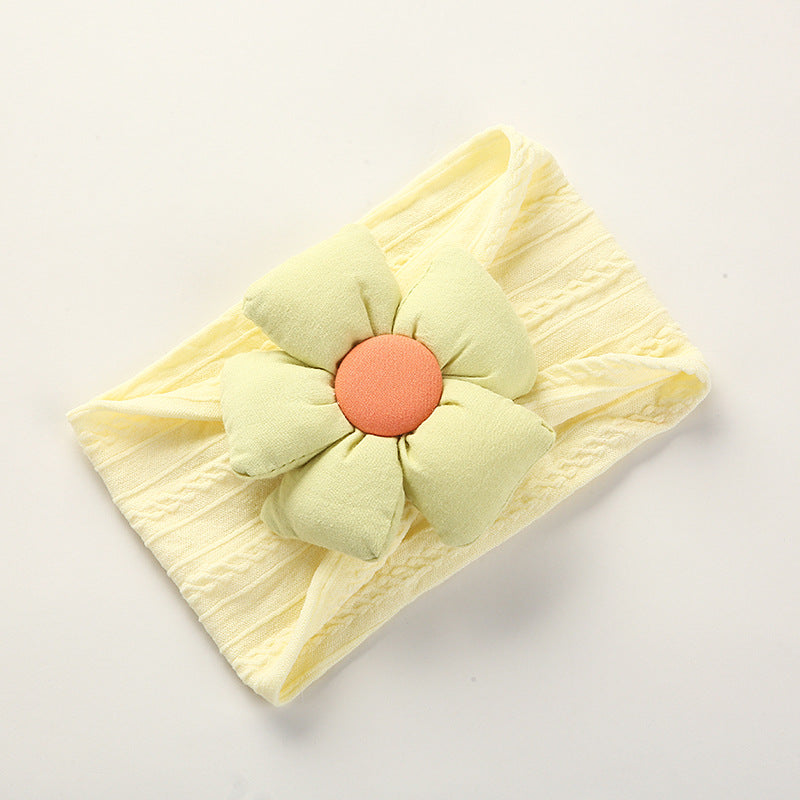 Soft Jacquard Nylon Baby Headband folded neatly for easy storage