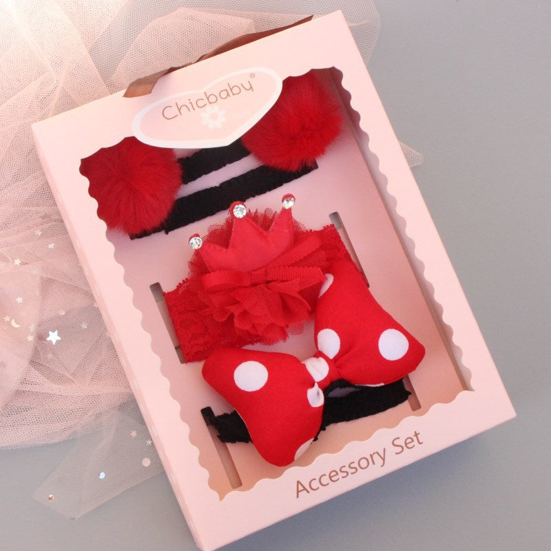 alt="Adorable Baby Hairband Gift Set with headband and jewelry pieces"