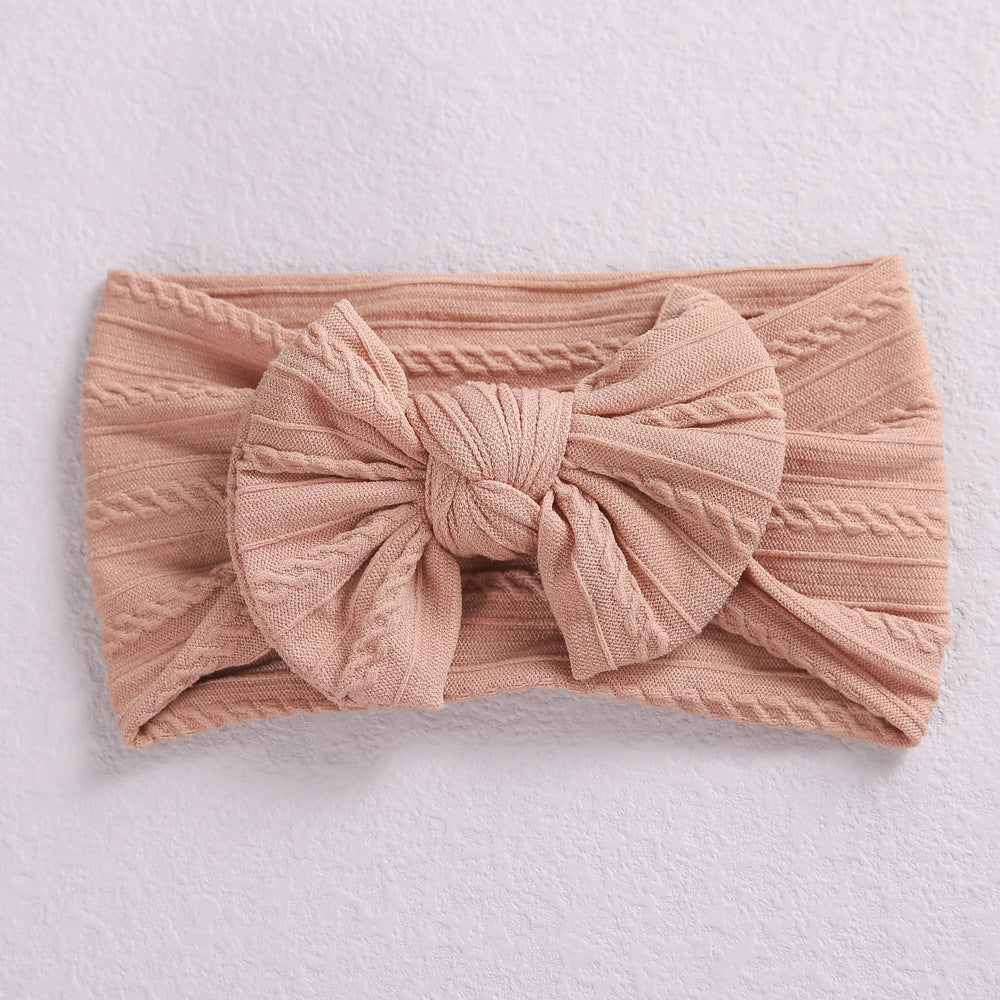 Elastic Nylon Baby Headband shown with matching outfit