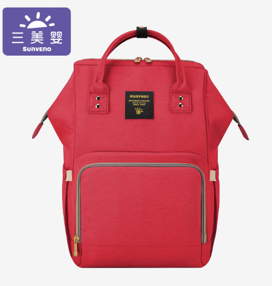 → Alt: Fully packed Maternity Diaper Bag showing all compartments in use